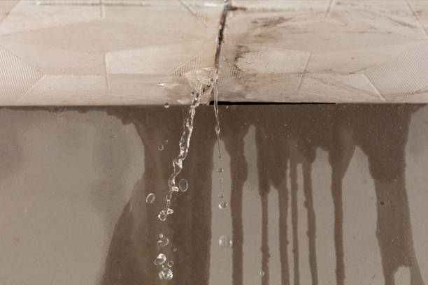 Professional Flood Damage Cleanup technician working in West Dennis, MA
